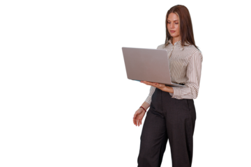 Businesswoman standing, holding a laptop, working on important corporate tasks. Transparent background, perfect for compositing