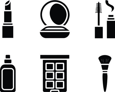 Collection of cosmetic products including lipstick, brush, mascara and eyeshadow palette items for makeup