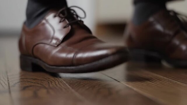 Shiny Brown Leather Shoes on Hardwood Floor Inside Home