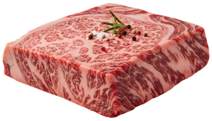 Fresh raw wagyu beef cube with rosemary and peppercorns isolated on white background