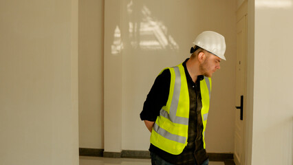 A construction foreman conducts an inspection at a construction site