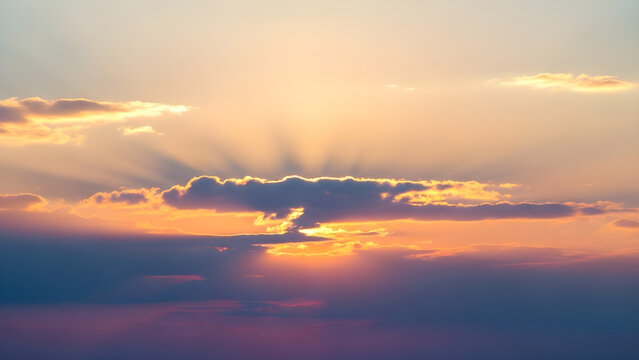 Dramatic sunset sky with golden light rays breaking through clouds evokes peaceful serenity and hope. isolated on white background