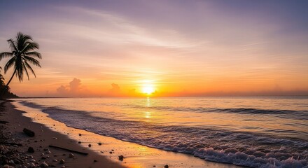 Tropical beach sunset with a palm tree silhouette and golden ocean waves.