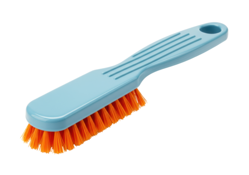Isolated lint brush with turquoise handle and orange bristles, household object for cleaning