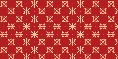 Elegant seamless pattern with golden snowflakes and tiny stars on a rich red background, perfect for Christmas wrapping paper, festive textiles, greeting cards, invitations and seasonal holiday design