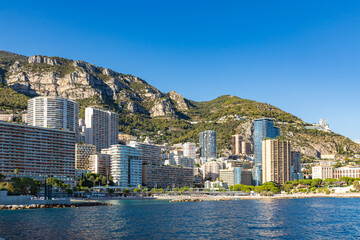 Picturesque cityscape of Monte Carlo with famous public beaches and spectacular modern skyscrapres,...