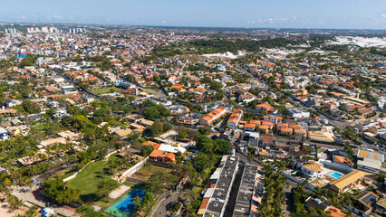 Salvador Coastal and Urban Landscape: Wide Aerial Perspective of Beach, Sea, and Residential Neighborhoods in Bahia, Brazil