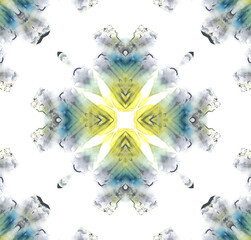 Abstract kaleidoscope pattern in blue and yellow tones. Colourful symmetrical texture painted with watercolor. Soft blurred elements create a decorative artistic background for modern design projects.