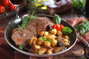 Pasticada with gnocchi, beef stew in a sauce. Croatian cuisine
