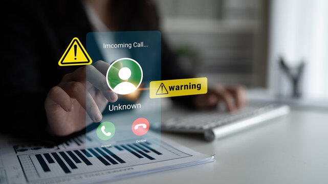 Modern office setting featuring a digital call interface alerting about an incoming unknown call, reflecting concerns over communication security and risk awareness. Gantry