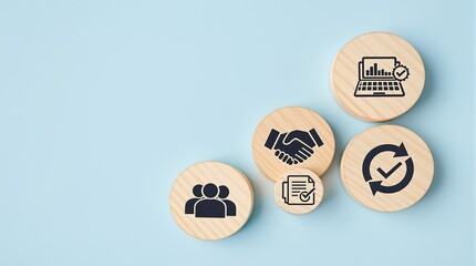 Wooden circles with business icons arranged on a light blue background representing business processes