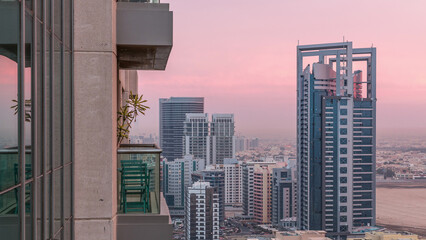 Obraz premium Greens district aerial view from top night to day timelapse.