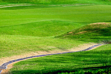 Panoramic view of the lush green fairways at Golf Course in Lukou, Taoyuan City, surrounded by...