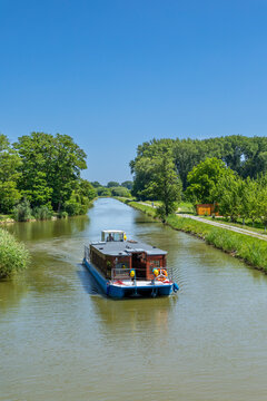 Canal boat navigating Bata Canal in Vnorovy