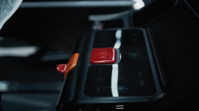 Shot of adaptive fitness in action. An athlete with a limb difference works on lower body strength using a leg press machine, assisted by a personal trainer. Highlights accessibility and determination