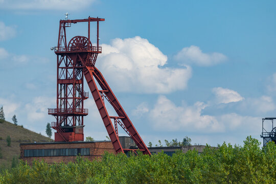 Mine headframe standing in Zacler, Czechia with blue sky
