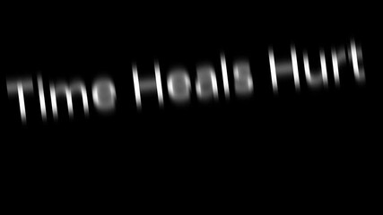 White text on black background stating time heals hurt with slight rotation and blur effect applied