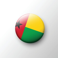 Fototapeta premium Glossy 3D Guinea-Bissau flag button with red yellow green colors