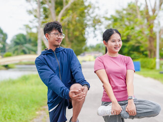 Asian fitness woman man smiles light exercise use smartwatch for healthy. Couple Gen Z lifestyle people activity new beginnings workout at park motivation goal planning wellness health care