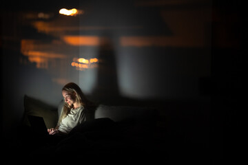 Burning the Midnight Oil &ndash; Woman Working Late on Laptop at Home