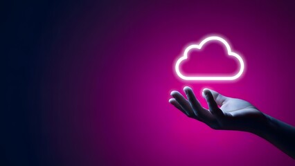 Hand reaching for a glowing cloud technology icon on a vibrant pink background