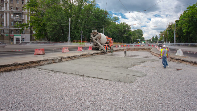 Road construction site with tram tracks repair and maintenance timelapse.