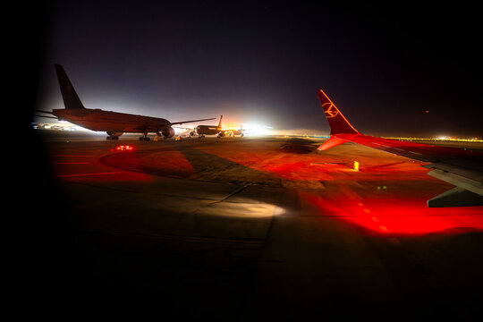 Riyadh, Saudi Arabia - November 25, 2025: Airplane on the Tarmac of King Khalid International Airport (RUH) in Riyadh at Night