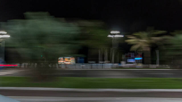 Fototapeta Driving on the night streets in Nice timelapse hyperlapse drivelapse, France.