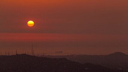Aerial view of the Pacific ocean during sunset timelapse from Cerro San Cristobal, Lima
