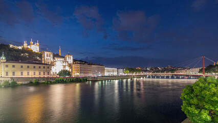 Timelapse of Saint John the Baptist Cathedral and Basilica of Notre-Dame de Fourviere in Lyon, from day to night. France