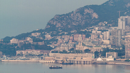Cityscape of Monte Carlo night to day timelapse, Monaco before summer sunrise.