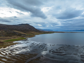 Aerial view of a coastline scenery with black beach in Iceland