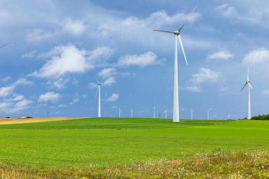 Wind turbines rotating for renewable clean energy in Saron sur Aube