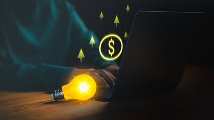 A glowing lightbulb beside a laptop symbolizes creativity, innovation, and online income growth, with digital dollar icons and upward arrows representing business ideas, and financial success.