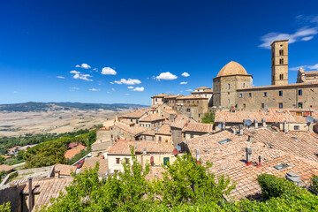 Volterra cityscape historical architecture and rural landscape view