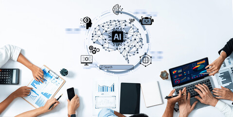 A collaborative team meeting focusing on artificial intelligence analysis, featuring laptops, charts, and active engagement in data-driven discussion in a modern office setting. Trope