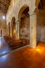 Obraz premium Romanesque church interior with frescoes in Monteriggioni, Tuscany