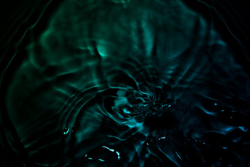 The water waves are green and black.