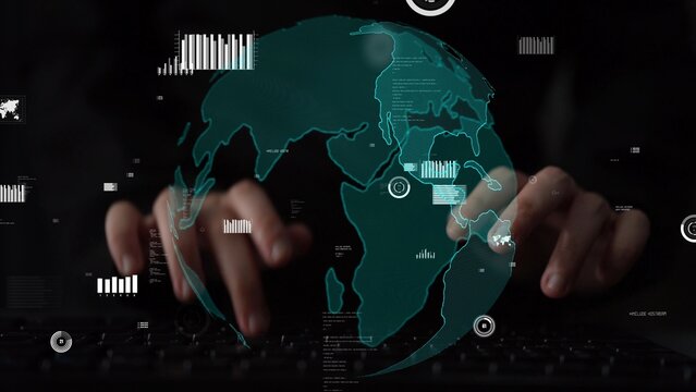 Close-up of hands typing on a keyboard with a digital globe overlay, symbolizing global communication and data insights in a technological landscape. Xenic