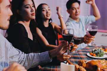 Diversity, dinner and group of people toast celebration together at party. Friends, happy and celebrate with food, wine and friendship for love, support and cheers champagne at business function