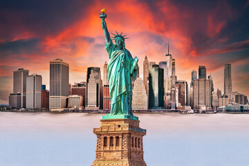 New York City downtown skyline panoramic sunset view with Lady Liberty statue