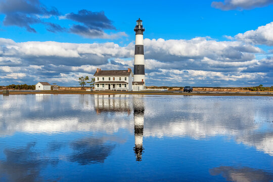 Bodie Island Lighthouse reflects in a pool in the Outer Banks of North Carolina