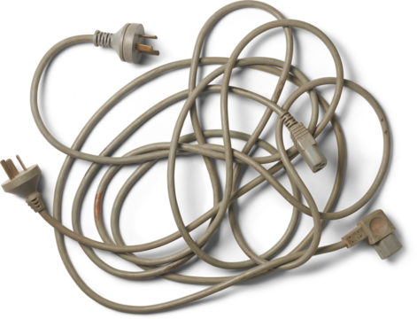 tangled heap of three-pronged electrical power cords, muted gray cables with plugs and connectors isolated white background, top view of dirty electronic waste