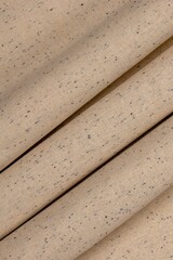 vibrant winter Khaddar loose fabric with a thread cone and needles