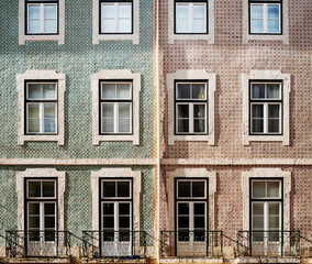 Fototapeta premium Typical old buildings in Lisbon's lower town, with their windows with balconies, lanterns, and decorative tiles. Lisbon, Portugal, 2023