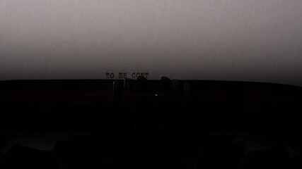 Paper with the message to be continued centered on a vintage typewriter, symbolizing narrative continuation, suspense, and the ongoing nature of stories, projects, and life events