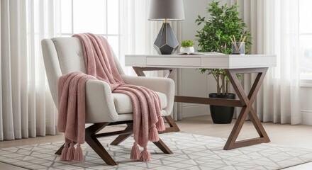 Cozy armchair with pink throw and modern desk