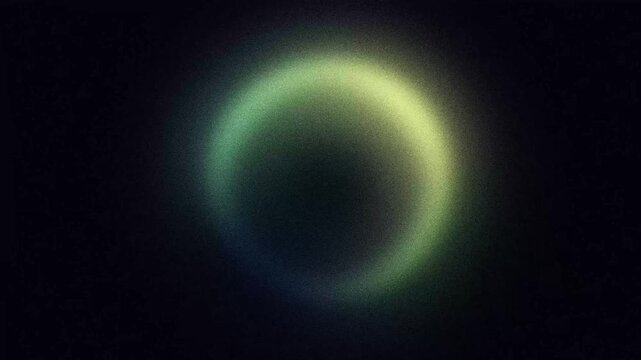 Abstract pulsing ring shape with grainy green and yellow gradient, animated looping background with noise texture