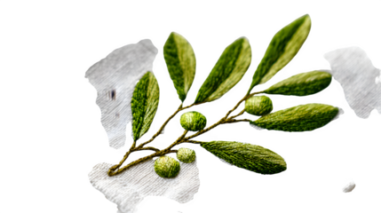 Linen cocktail napkin with hand-embroidered mistletoe in green and white, isolated on white background