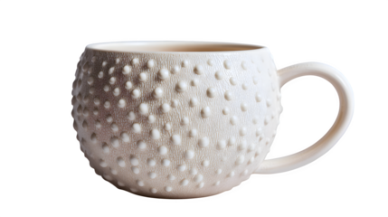 Matte ceramic Christmas cup with raised dot texture mimicking snow, isolated on white background